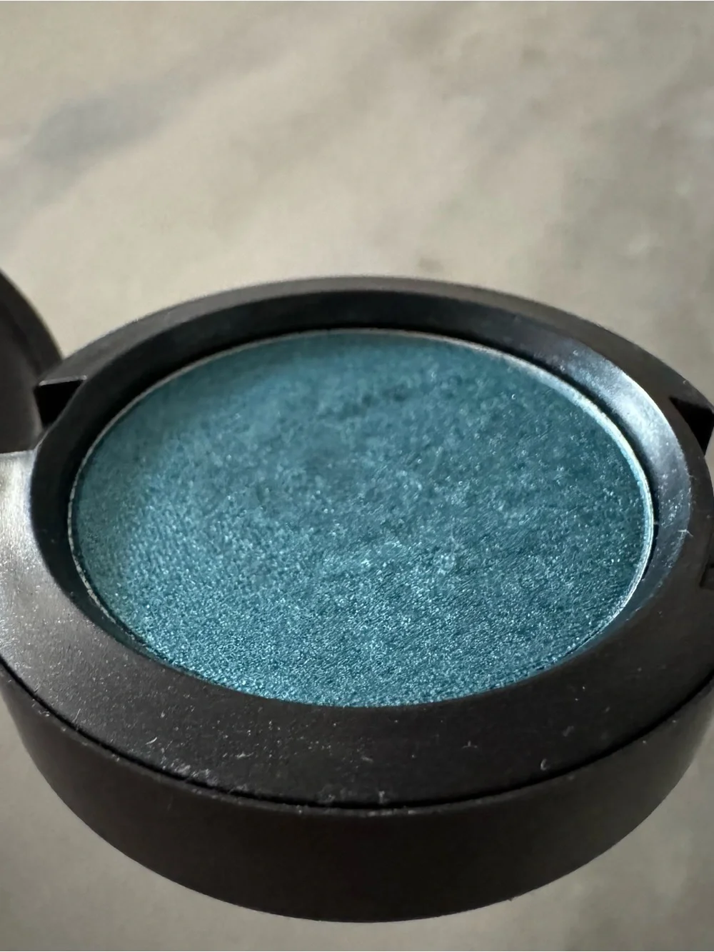 MAC Cosmetics Mineralize Eye Shadow compact, specifically in the shade Opalisque